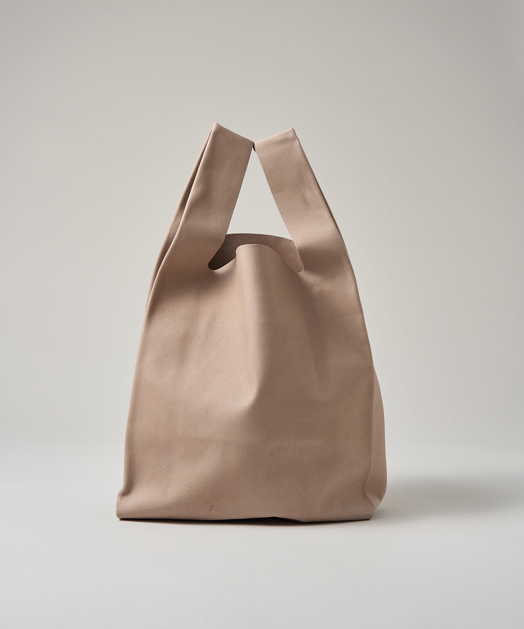 REN】《トートバッグ》シンプルで軽い、レジ袋型のレザーバッグ。