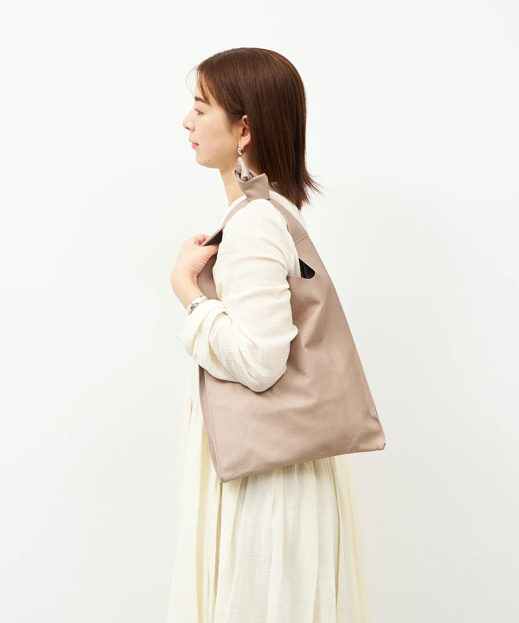 軽くて柔らかい豚革ショルダーバッグ - シンプルなレジ袋スタイル – REN